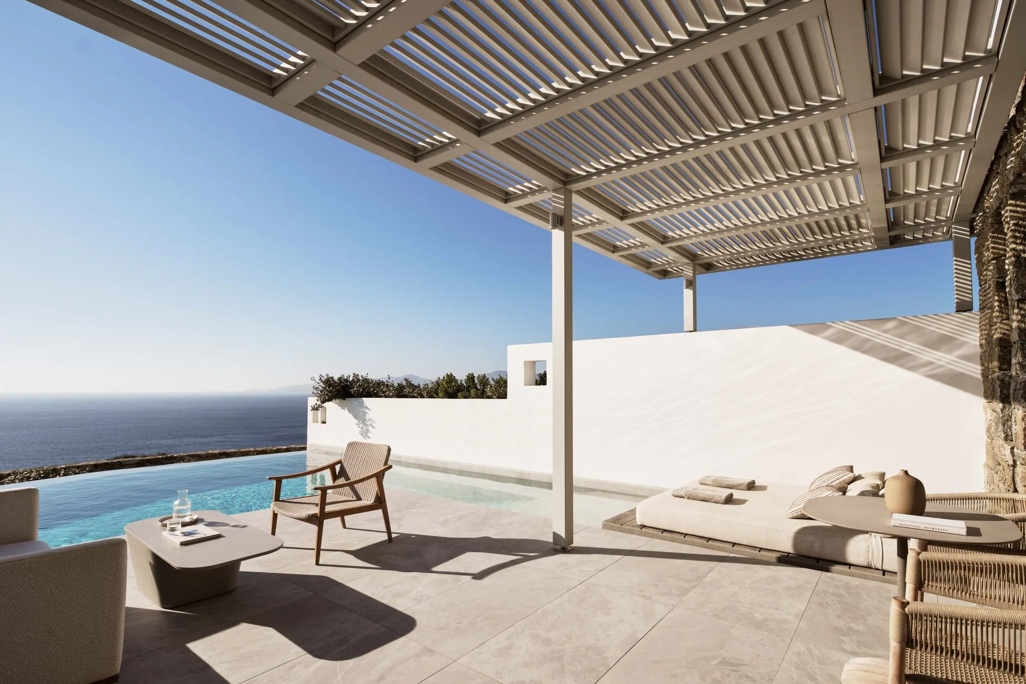 Liegen unter einer Pergola mit offenem Blick auf die Ägäis