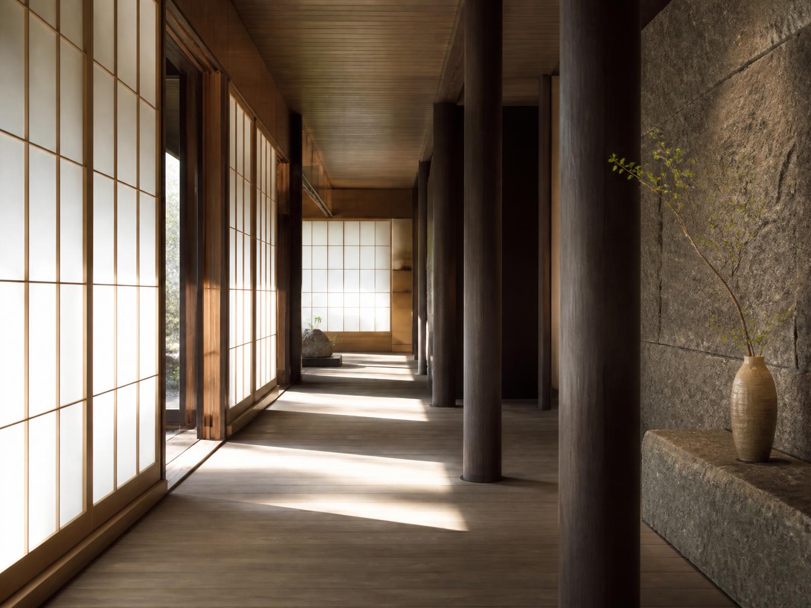 Japanese minimalist corridor with washi paper screens, dark camphor columns, a rough stone wall and long shafts of daylight